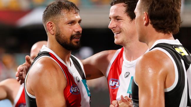 Paddy Ryder is consoled by teammates after injuring himself during the elimination final against Western Bulldogs.