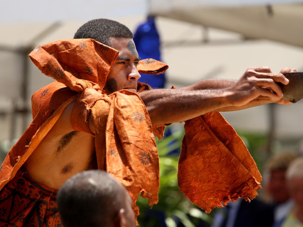 The Duke and Duchess of Sussex Prince Harry and Meghan take part in a traditional fijian ceremony at Nadi Airport in Fiji to . Picture: Nathan Edwards