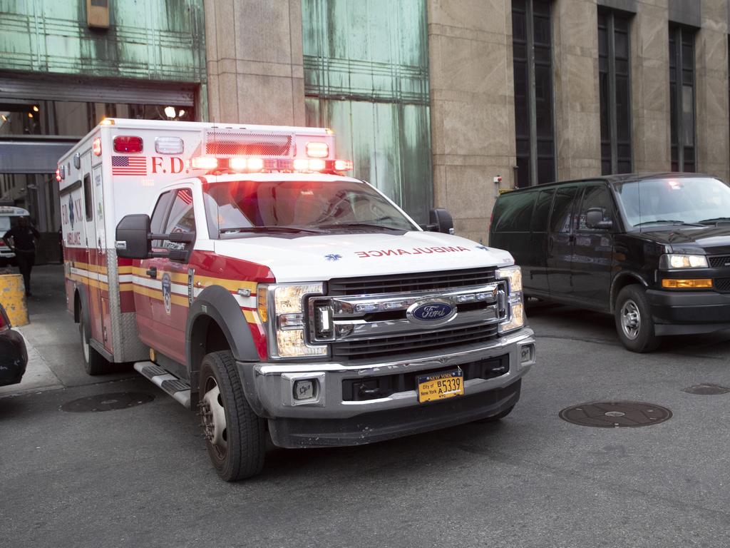An ambulance carrying Harvey Weinstein is escorted from a Manhattan courthouse. Picture: Mary Altaffer/AP