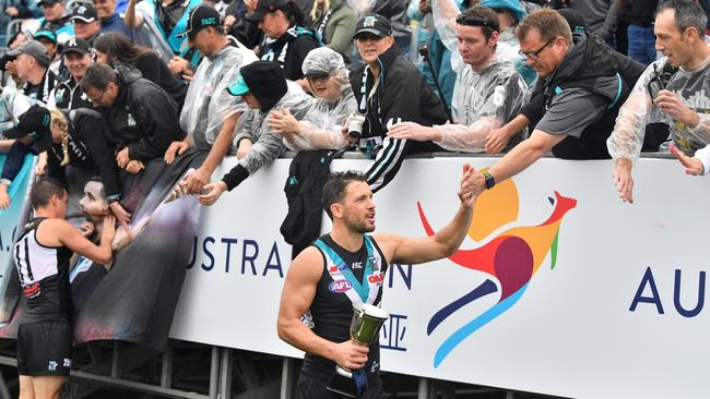 Power skipper Travis Boak thanks fans after the club’s second win against Gold Coast Suns in China. Picture: AAP Image/David Mariuz