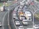 Morning commuters battled delays over an hour on the Gateway Motorway after a two vehicle crash in which one vehicle rolled on Wednesday morning. Photo: TMR