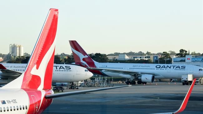 A close call involving two Qantas aircraft has prompted an investigation into air traffic control at Sydney airport. Picture: AAP