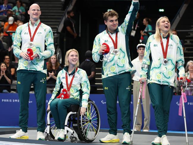 NANTERRE, FRANCE - SEPTEMBER 07: Silver medalists Alexa Leary, Callum Simpson, Chloe Osborn and Rowan Crothers of Team Australia pose for a photo during the Mixed 4x100m Freestyle Relay - 34 Points Medal Ceremony on day ten of the Paris 2024 Summer Paralympic Games at Paris La Defense Arena on September 07, 2024 in Nanterre, France. (Photo by Sean M. Haffey/Getty Images)