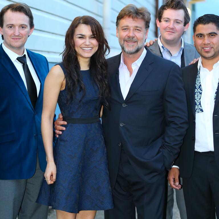 Crowe puts his arm around his Les Miserables co-star Samantha Barks. Picture: Splash News