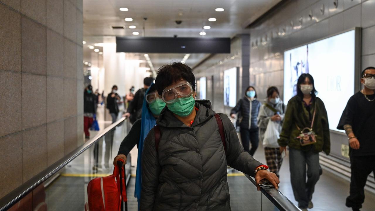 Fears of a pandemic have risen after multiple cases of the virus were detected without any clear source of infection in South Korea and Iran. (Photo by Hector RETAMAL / AFP)