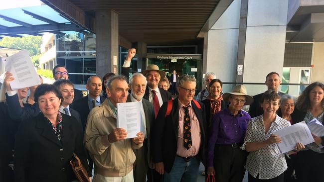 Community group Oakey Coal Action Alliance rejoice outside court in Brisbane in May 2017. Picture: AAP