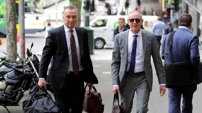 Craig Emerson and Jay Weatherill arrive for the ALP National executive meeting to receive the ALP review in Melbourne. Picture: Stuart McEvoy