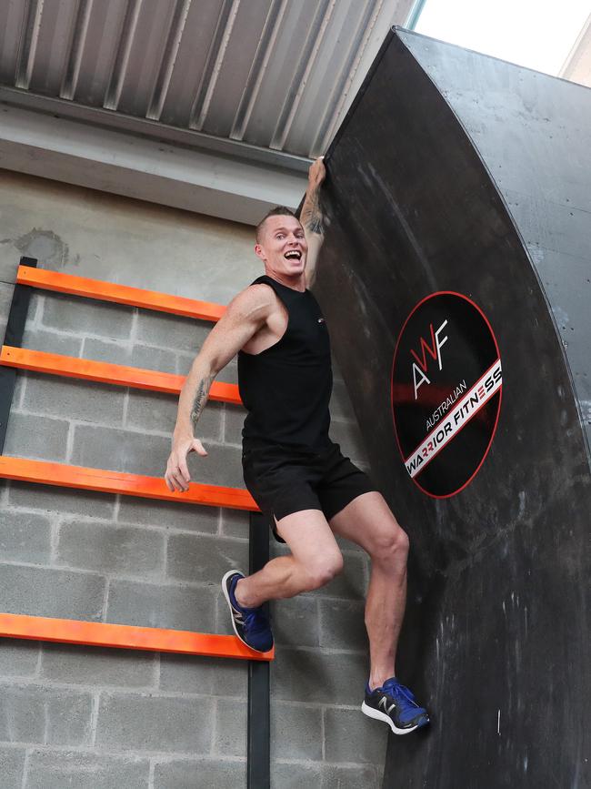 The warped wall is a popular obstacle. Picture: Sue Graham