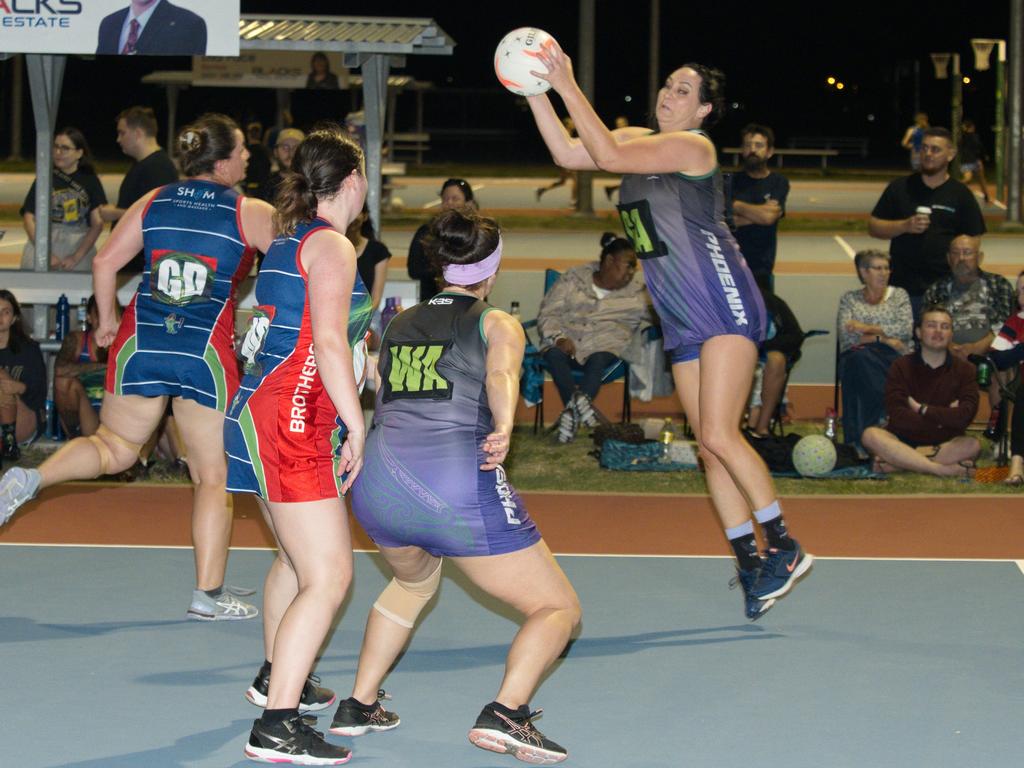 Heidi Philpott extends to maintain possession of the ball against Brothers' Stella Giliomee (left) and Lia Dunsmore in the 2021 Mackay Netball Association seniors grand final. September 4th, 2021 Picture: Marty Strecker