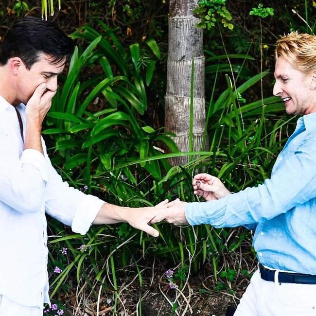 Damien Anthony Rossi proposing to his partner Jason Avery at the pair’s home in Brisbane.