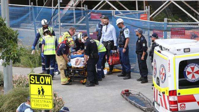 One worker was rushed to hospital and remains is in a critical condition. Picture: Richard Dobson