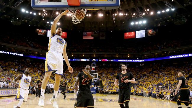 Klay Thompson dunks in the second quarter. Picture: AFP