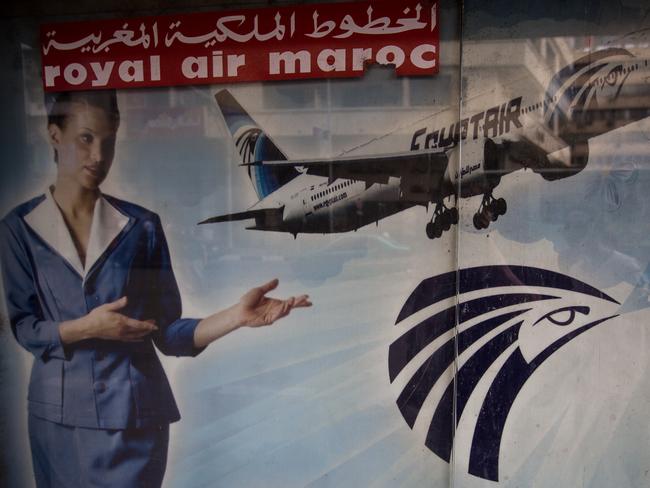 CAIRO, EGYPT - MAY 23: An advert promoting EgyptAir is seen on the outside of a travel agency on May 23, 2016 in Cairo, Egypt. Egypt's tourism industry has struggled to recover since the uprising in 2011, the ISIS attack on a Russian metro jet and the hijacking of an EgyptAir flight in March. Despite last weeks crash of EgyptAir flight MS804 Egypt's Tourism Minister Yehia Rashed said in a statement on Sunday he hoped the country would attract 12 million tourists back by the end of 2017. Egyptian President Abdel Fattah el-Sisi announced Sunday that a submarine will be deployed to search for the flights 'black box'. The submarine can reach depths of 3,000 meters. EgyptAir flight MS804 crashed into the Mediterranean Sea en-route to Cairo from Paris carrying 66 passengers and crew. Wreckage including seats, personal belongings and human remains have been located 290kilometres north of Egypts port city of Alexandria and data taken from the aircrafts ACARS system show several smoke alerts near the cockpit just minutes before the flight crashed. (Photo by Chris McGrath/Getty Images)