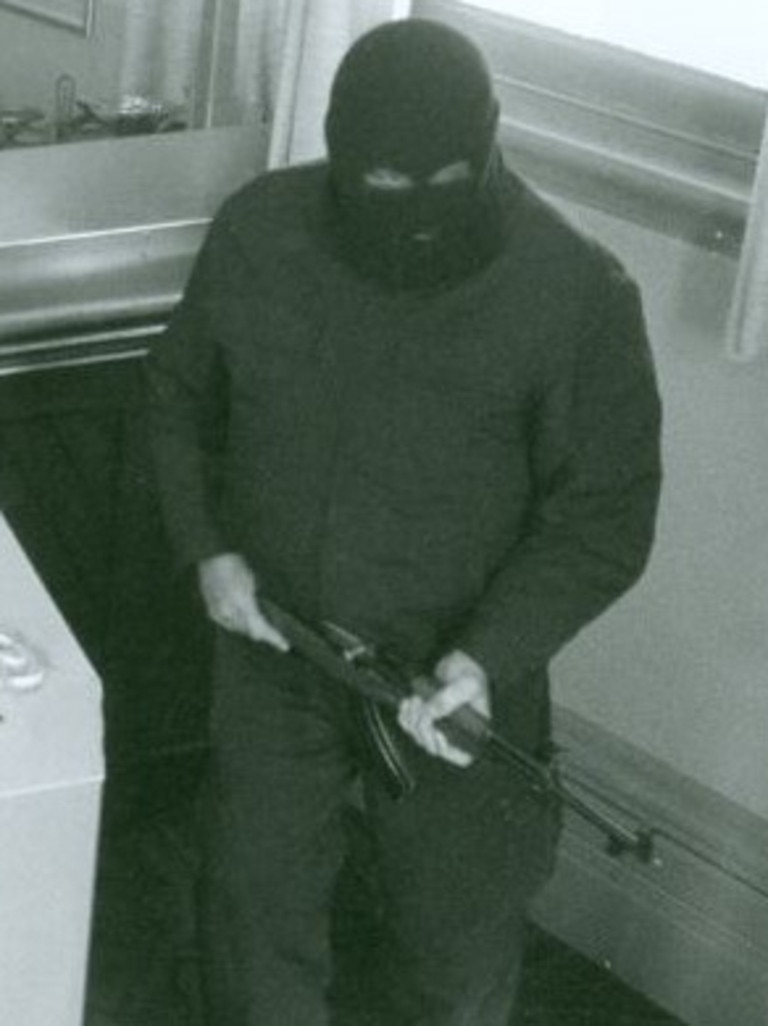 Parsons with his distinctive SKK 7.62 rifle during one of his robberies. Picture: SA Police