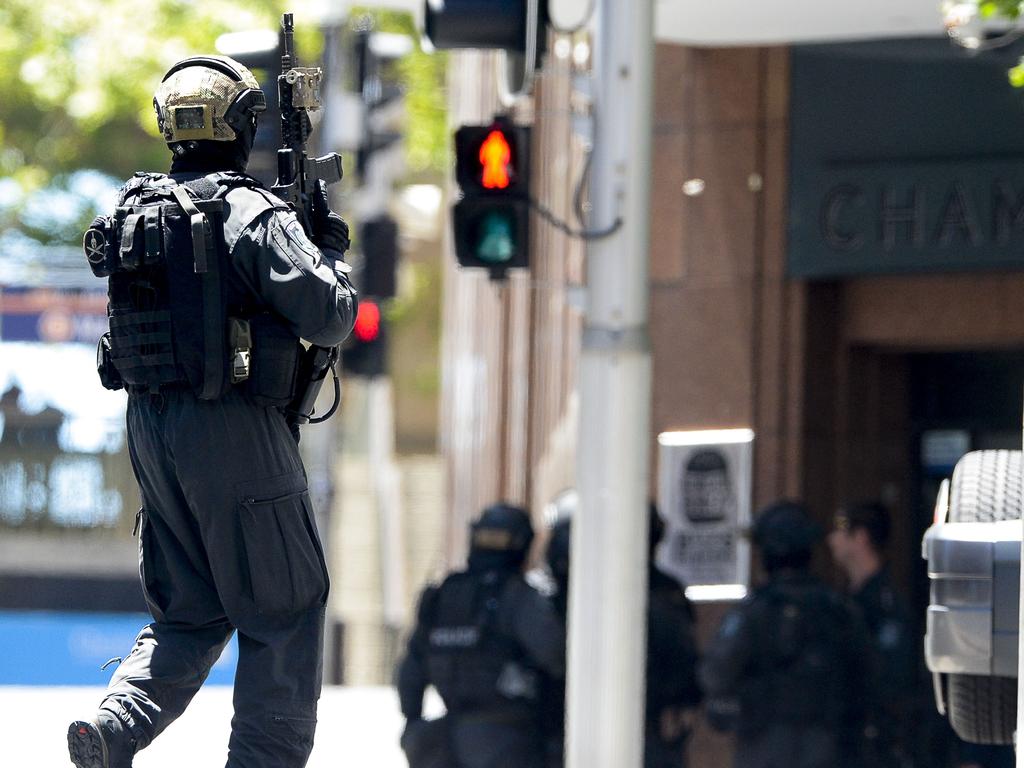 Police attend a siege in the Lindt shop in Sydney’s Martin Place. Photo: Chris McKeen