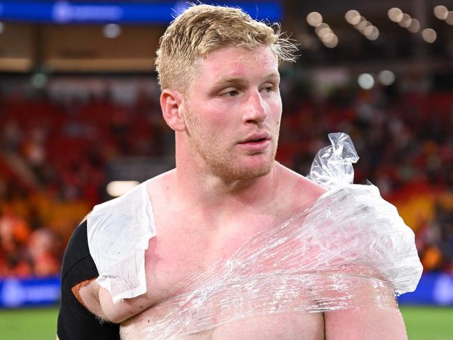 Prop Thomas Flegler ices his injured shoulder after the Dolphins v Tigers clash at Suncorp Stadium. Picture: NRL Images