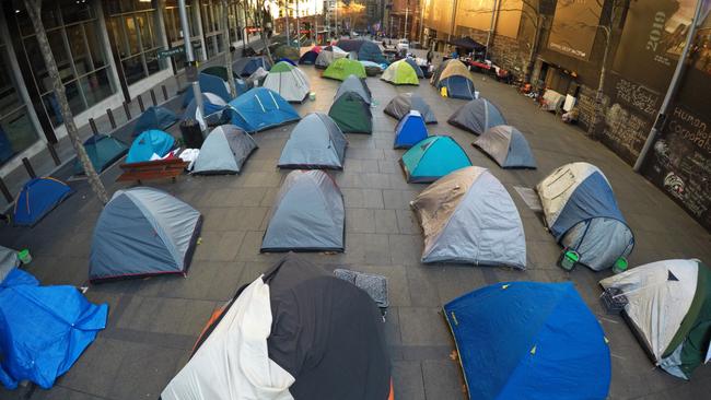 The residents of Sydney's tent city                     The tent city which popped up outside the Reserve Bank in Martin Place. Picture: Toby Zerna