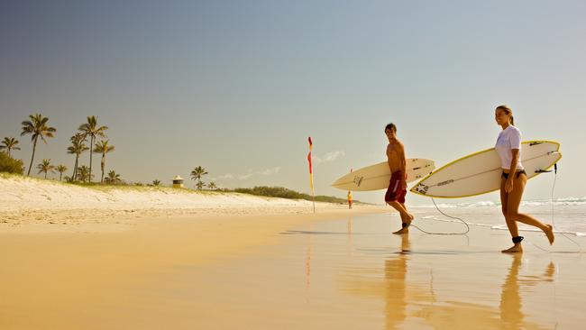 Images of boardriders emerging from the surf on the Gold Coast form part of the new Tourism Australia campaign to attract working holidaymakers from overseas.