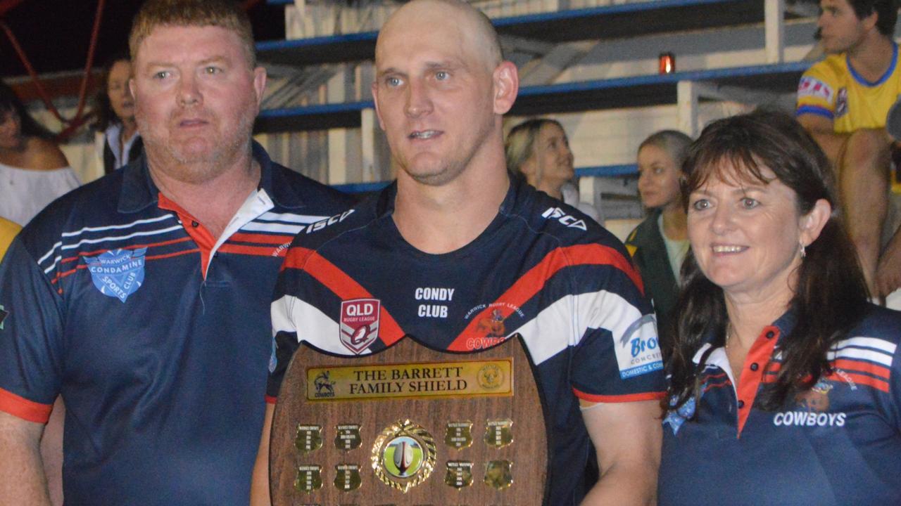 Warwick Cowboys captain Mick Bloomfield holds the Barrett Shield tight for another year