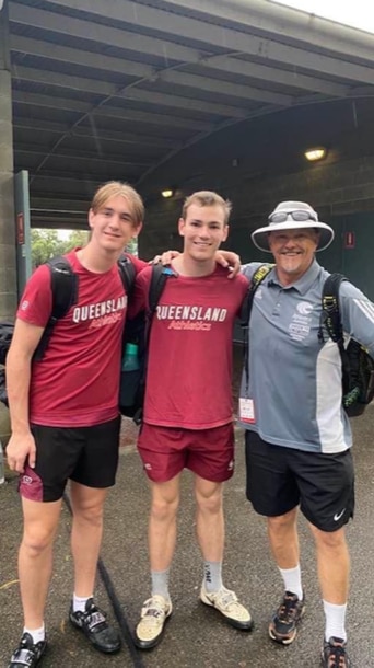 Ben Roberts with teammate Will Higgins and elite throws coach Brett Green.