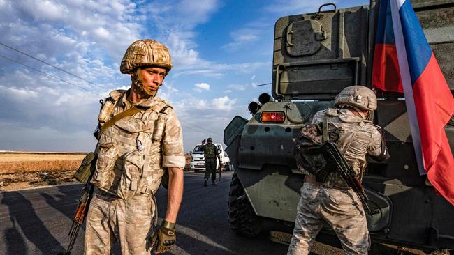 Russian military forces on patrol near the northeast Syrian town of Amuda. Picture: AFP