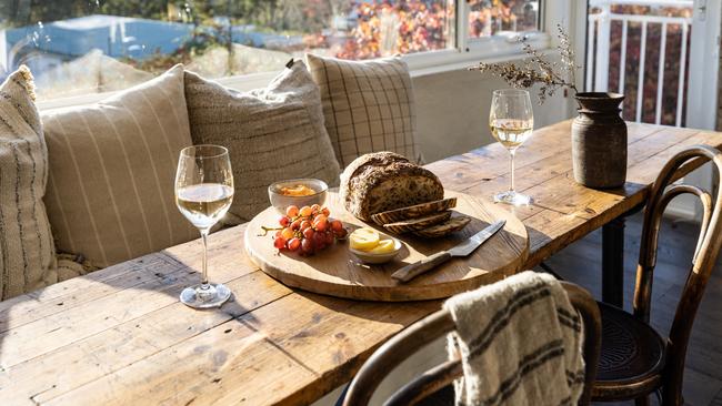 The Binney’s sunny dining nook complete with French bistro dining table. Picture: Dearna Bond