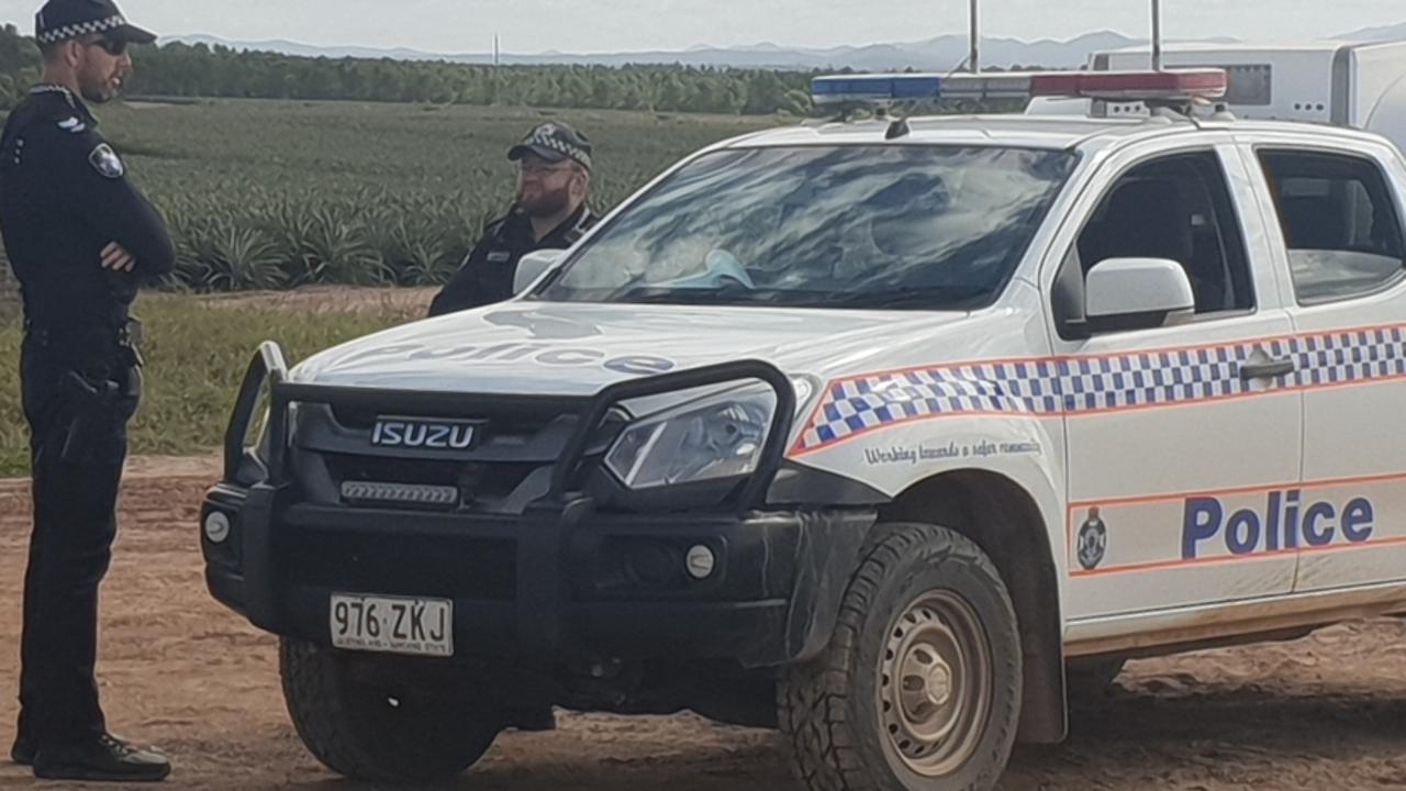 Police officers at the scene of the Wednesday, July 14, 2021, pineapple farm death. The incident occurred at Lake Mary Pines in Bungundarra, near Yeppoon.