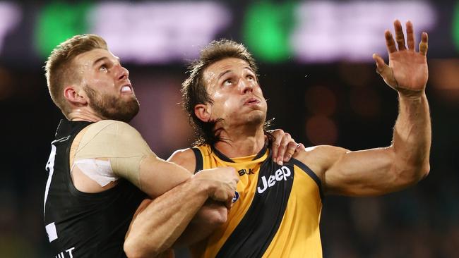 Ivan Maric battles in the ruck against Jackson Trengove during a clash between Richmond and Port Adelaide in 2016. Picture: Morne de Klerk/Getty Images