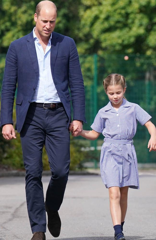 Princess Charlotte has a spring in her step as she walks with her father Prince William. Picture: Jonathan Brady - Pool/Getty Images