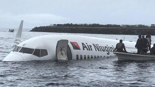 The aircraft hit the water 460 metres short of the runway, investigators found. Picture: James Benito/AFP