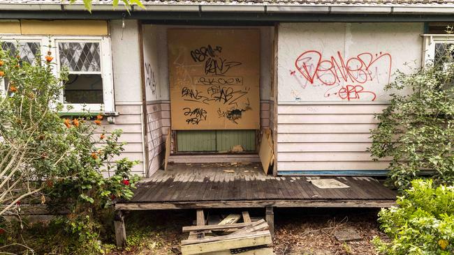 One of the abandoned houses on the corner of Anzac St and Gallipoli Pde in Croydon. Picture: Daniel Pockett