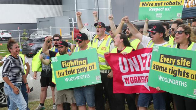 Woolworths workers on a picket line. Picture: NewsWire/ David Crosling