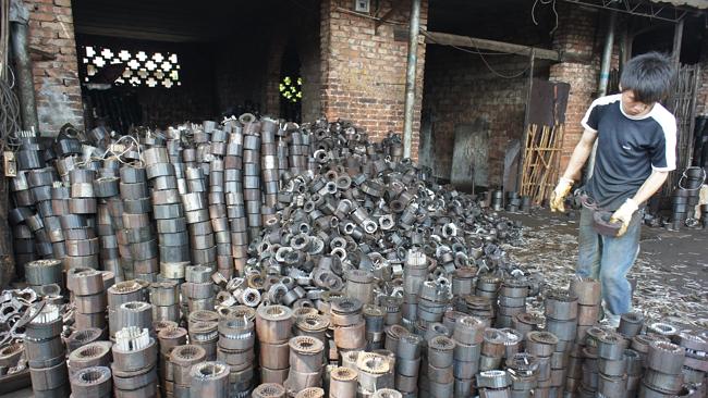 Piles of electrical motor parts in Taizhou, China which will be used in rebuilt motors. Pic: Adam Minter. 