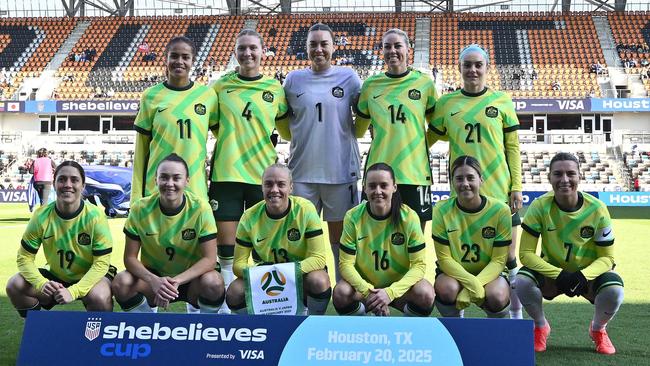 The Matildas pose for a team photo before their She Believes Cup game against Japan. Photo: Maria Lysaker/Getty Images/AFP