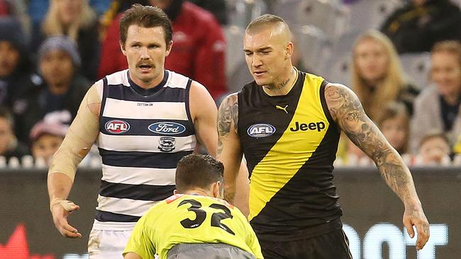 Patrick Dangerfield and Dustin Martin talks with field umpire Jacob Mollison. Picture: Michael Klein