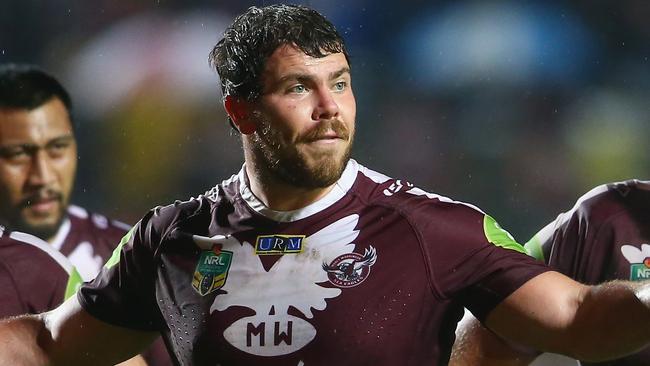 SYDNEY, AUSTRALIA — AUGUST 23: Blake Leary, Josh Starling and Jake Trbojevic of the Eagles look dejected during the round 24 NRL match between the Manly Warringah Sea Eagles and the Parramatta Eels at Brookvale Oval on August 23, 2015 in Sydney, Australia. (Photo by Mark Kolbe/Getty Images)