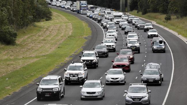 Sydney commuters are being slugged thousands of dollars per year in road tolls. Picture: Jonathan Ng