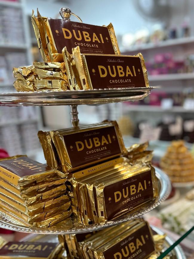 Dubai Chocolate bars are displayed on a three-tier silver platter. Picture: Supplied