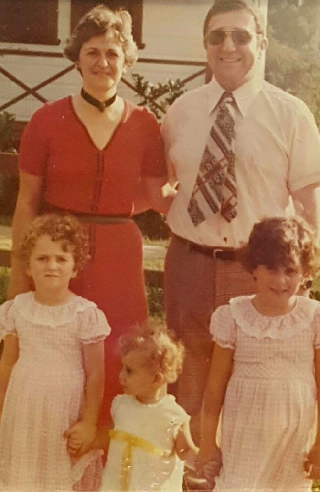 Gladys Berejiklian (bottom right), with her mum Arsha, dad Krikor and sisters Rita and Mary outside their family home in Ryde in 1980. Pic: supplied by the family.