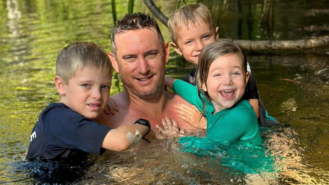 Principal of SEDA College NT Francis Gill, pictured with his children Harry, 7, Lenny, 5, and Audrey, 3, has opened up about his battle with dad guilt.