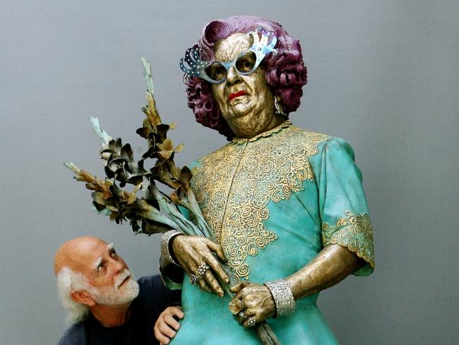 Artist Peter Corlett with his statue of Dame Edna Everage.