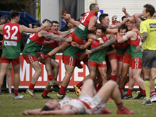 Pines celebrate after winning the MPNFL Division 1 grand final in 2018. Picture: Andy Brownbill