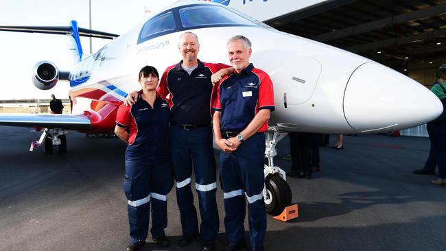 Flight nurse Jodie Hunter and pilots Steve Gore and Andrew Smith with the new PC-24 Royal Flying Doctors Jet at Adelaide Airport. Picture: Mark Brake