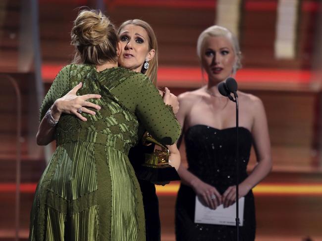 Celine Dion presents Adele the award for song of the year for “Hello” during The 59th GRAMMY Awards at STAPLES Center on February 12, 2017 in Los Angeles, California. Picture: AP