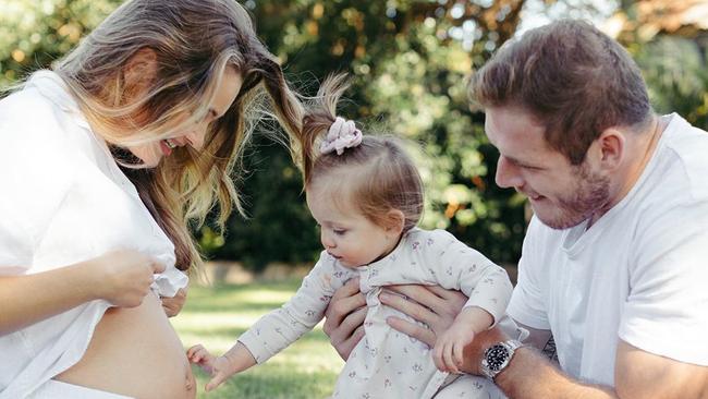 Tahlia Giumelli is pictured with her one-year-old daughter Sophie and fiancé Tom Burgess