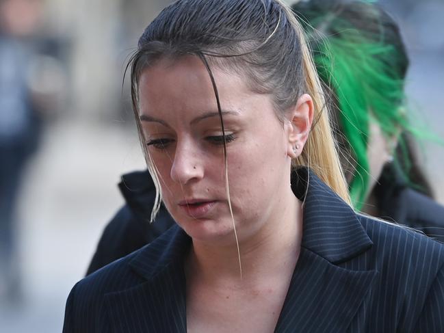 16/7/24. Anastasia Marshall ( Black Blazer ) outside the Adelaide Magistrates Court today .  charged with assisting in the  murder of  Krystal Marshall. Picture: Keryn Stevens