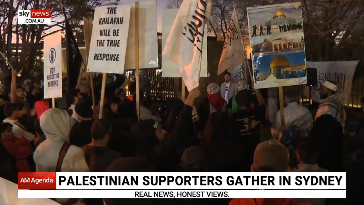 Palestinians hold rally to express support for Israel attack