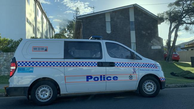 Police outside a Gladstone residence where the body of a person was discovered this afternoon.