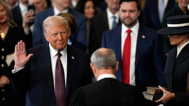 Donald Trump is sworn in by Chief Justice John Roberts. Picture: AFP