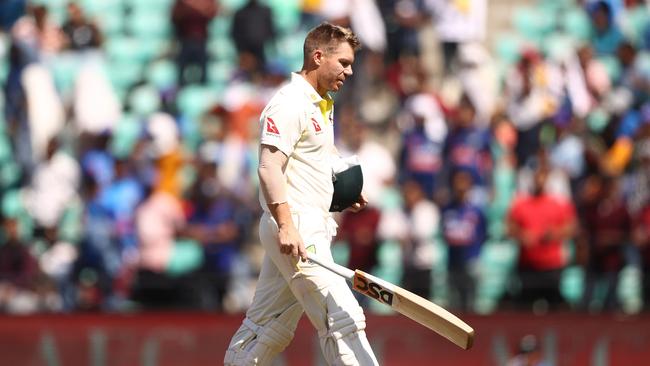 NAGPUR, INDIA - FEBRUARY 11: David Warner of Australia walks off after he was dismissed by Ravichandran Ashwin of India during day three of the First Test match in the series between India and Australia at Vidarbha Cricket Association Ground on February 11, 2023 in Nagpur, India. (Photo by Robert Cianflone/Getty Images)